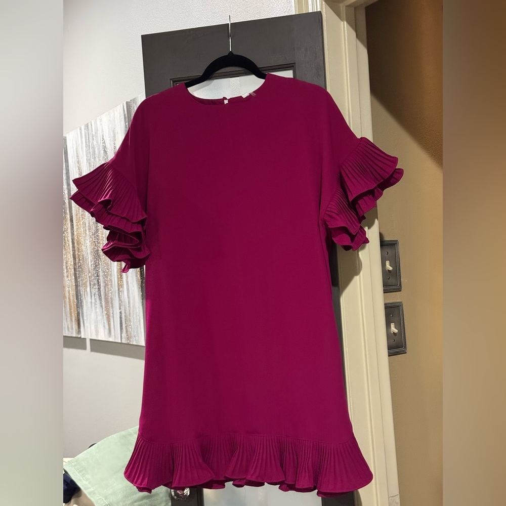 Boutique purchase. Beautiful dress. Never worn